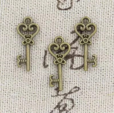 BRELOQUE CLEF - BRONZE